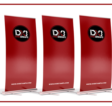 DXBStamps branded roll-up banner stands