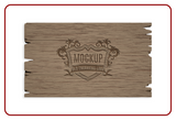 Wooden mockup with engraved old engraving logo on a white background