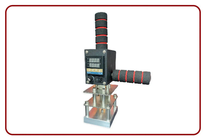 Black digital display handheld machine with red and gray grip handle