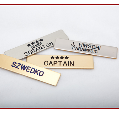 Engraved metal name badges for clinic staff