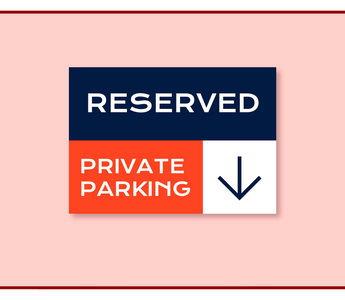 Reserved private parking directional sign with a down arrow