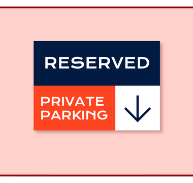 Reserved private parking directional sign with a down arrow