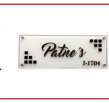 Engraved-style acrylic door name plate with a company name and unit number