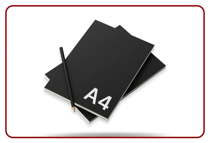 Black a4 notebook with gold pen and red border