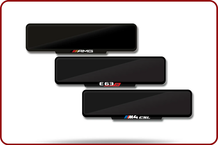 Black rectangular car license plate covers with amg, e63 and m4 csl logos.