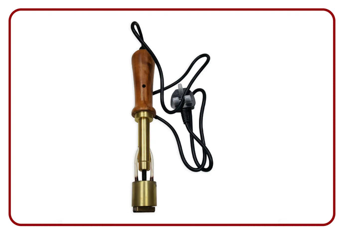 Brass and wood soldering iron with black cord