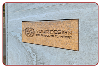 Wooden plaque with engraved text on a textured surface