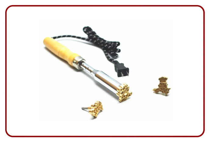 Gold and silver chain tool with wooden handle, black cord design